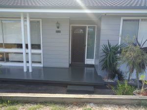 Front of house painted in blue