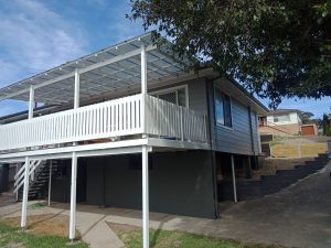 Big outdoor deck painted in white by a maitland painter