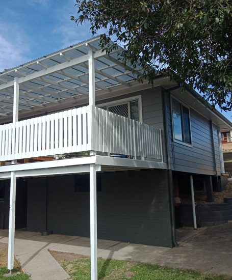 Big outdoor deck painted in white by a maitland painter